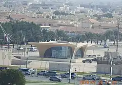 View of one of the entrances to the Sport City Metro Station with Al Waab in the background