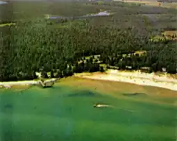 Aerial view of the present-day location of the Glidden Lodge Beach Resort condos and vicinity, published 1963
