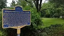 a picture of the marker with a small field behind it