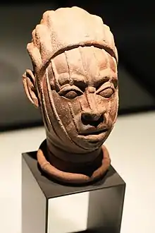 Memorial head with vertical facial striations typical of ife heads, Nigeria, 12th century AD, terracotta - Ethnological Museum, Berlin