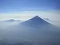 Volcan de Agua exhibits the steep cone shape typical of stratovolcanoes; as seen from Acatenango's Pico Mayor.