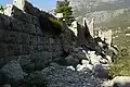 View N along the east wall of the citadel from outside the postern gate.