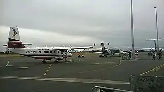 Air Safaris Nomad on gate 3 at Christchurch Airport December 2014.