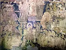 Many foreign ambassadors, representatives, and travelers are included as devotees attending the Buddha's descent from Trayastrimsa Heaven; painting from Cave 17 of the Ajanta Caves.