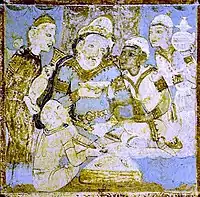 Sasanian dignitary drinking wine, on ceiling of Cave 1, at Ajanta Caves, India, end of the 5th century.