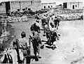 Members of the Yiftach Brigade entering al-Malikiyya, May 1948