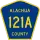 County Road 121A marker