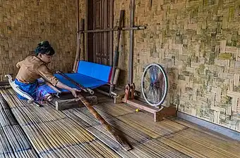 Weaving narrow cloth in Indonesia