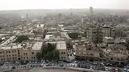 City view with a wall and a mosque.