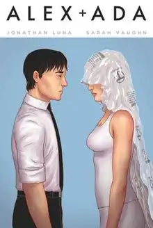 Alex and his new android face each other in a pose similar to a bride and groom during a wedding.