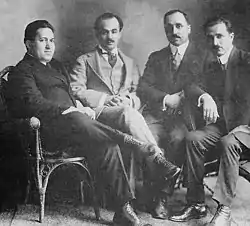 Four members of the Pen League in 1920. Left to right: Arida, Kahlil Gibran, Abd al-Masih Haddad, and Mikha'il Na'ima