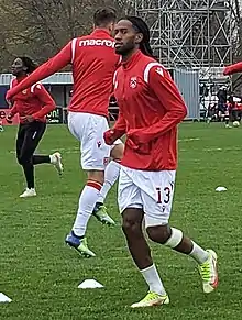 Player jogging during warm-up