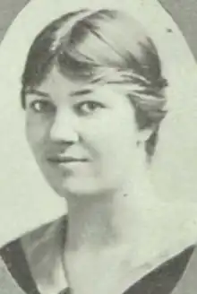 A young white woman, hair parted center and dressed back to the nape, in an oval frame