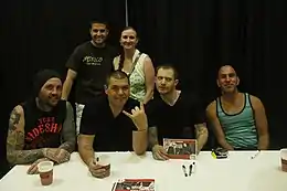 Alien Ant Farm posing with fans in 2015.From left to right: Terry Corso, Dryden Mitchell, Tim Peugh, Mike Cosgrove.
