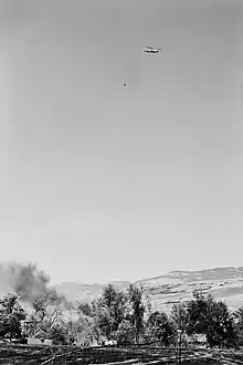 A helicopter carries water over the Almeda Fire at its point of origin in Ashland, Oregon, on September 8, 2020.