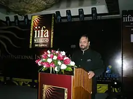 Koch delivers a speech at 11th IIFA Awards