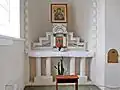 Left panel: altar of Our Lady of Perpetual Help.