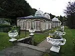 The Conservatory and attached Wall, Steps and Urns