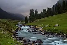 River and foggy mountains