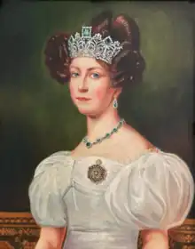 Empress Amélie of Brazil wearing an emerald parure and the insignia of the Order of the Rose