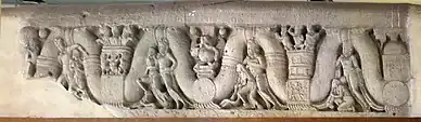 Coping stone relief with garland bearers
