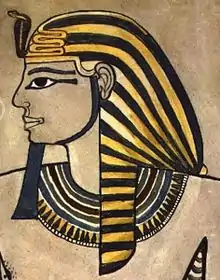 Amenhotep II standing before Osiris.