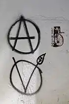 Vegan graffiti showing an Enclosed V in Lisbon, Portugal