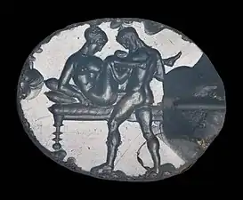 Engraving of a sexual scene on an ancient Greek gem