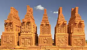 Five tombstones with delicate stone carvings