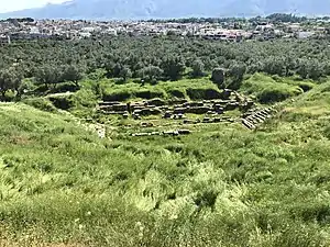 Theater of ancient Sparta, with modern Sparta and Mt. Taygetus in the background