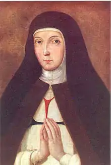 Portrait painting of a nun with hands clasped in prayer.