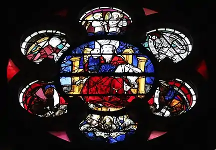 Center of the south rose window by André Robin (1451), depicting Christ in Majesty, surrounded by angels musicians, Old Men of the Apocalypse, and signs of the Zodiac