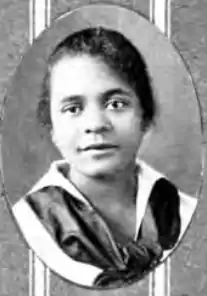 A yearbook portrait of a young black woman, from 1921.