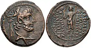 A coin of king Antiochus XII. On its reverse, the Greek god Zeus is depicted, while the obverse has the king's bust