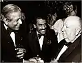 Anton Wickremasinghe, Chandran Rutnam (center) and Alfred Hitchcock at the Academy Awards in Los Angeles.