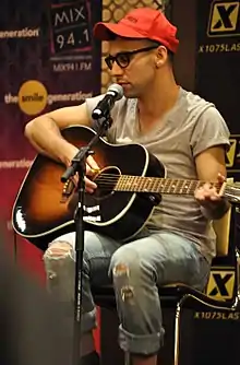 Jack Antonoff on a guitar