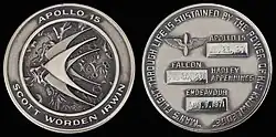 Both sides of a silver "Robbins" medallion with the mission logo and dates of travel