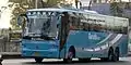 An APSRTC Garuda Plus Mercedes Benz Intercity Coach en route to Vijayawada in Hyderabad, India. APSRTC was one of the first bus operators in India to buy Mercedes Benz buses.