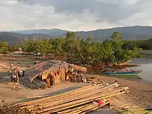 Aquaculture, salt and fishponds in the bay, and an extensive mature mangrove patch, in 2006