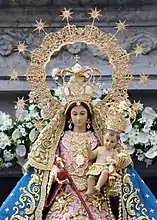 The Canonically Crowned Image of Our Lady of Aránzazu is brought out from the shrine for a procession.