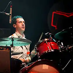 Gara performing with Arcade Fire at the Eurockéennes in 2007