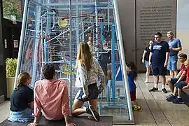 Archimedean Excogitation can be found at the Boston Museum of Science and is said to hold the attention of viewers for much longer than many of the other exhibits housed there.