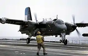 An Argentine Navy S-2T Turbo Tracker lands on the Brazilian aircraft carrier NAe São Paulo