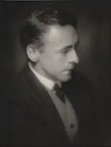 profile head and shoulders of clean-shaven man in middle age