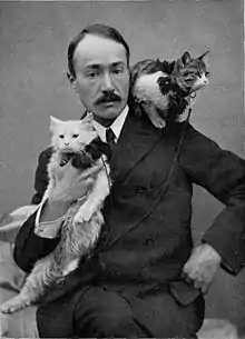 Arnold Henry Savage Landor, with kittens Kerman and Zeris, with whome he travelled in Across Coveted Lands