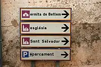 Signs for ermita de Betlem, església, Sant Salvador, aparcament