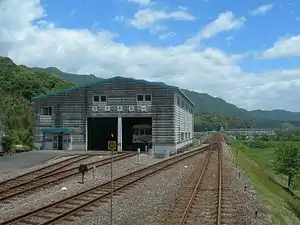 The Asa Kaigan train depot. The Shishikuui Station platform can be seen in the distance to the right.