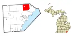 Location within Monroe County (red) and the administered village of Carleton (pink)