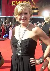 Ashley Jensen in a black gown with a feature jewelled neckline