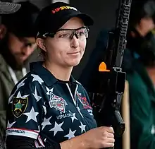 Long guns (rifles and shotguns) must have a brightly colored chamber flag inserted when the firearm is not in use.